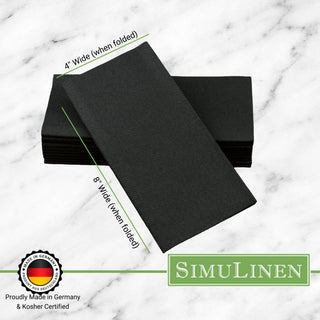 Black Cloth-like napkins on a marble background. The napkins are made in Germany & Kosher certified. They measure 4" wide by 8" long.