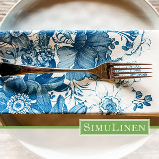 A top-down view of SimuLinen blue garden luxury paper napkins with a fork on top.
