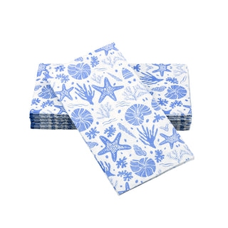 Image of SimuLinen nautical guest towels on a white background. These guest towels are white, with blue seashells and starfish all over.