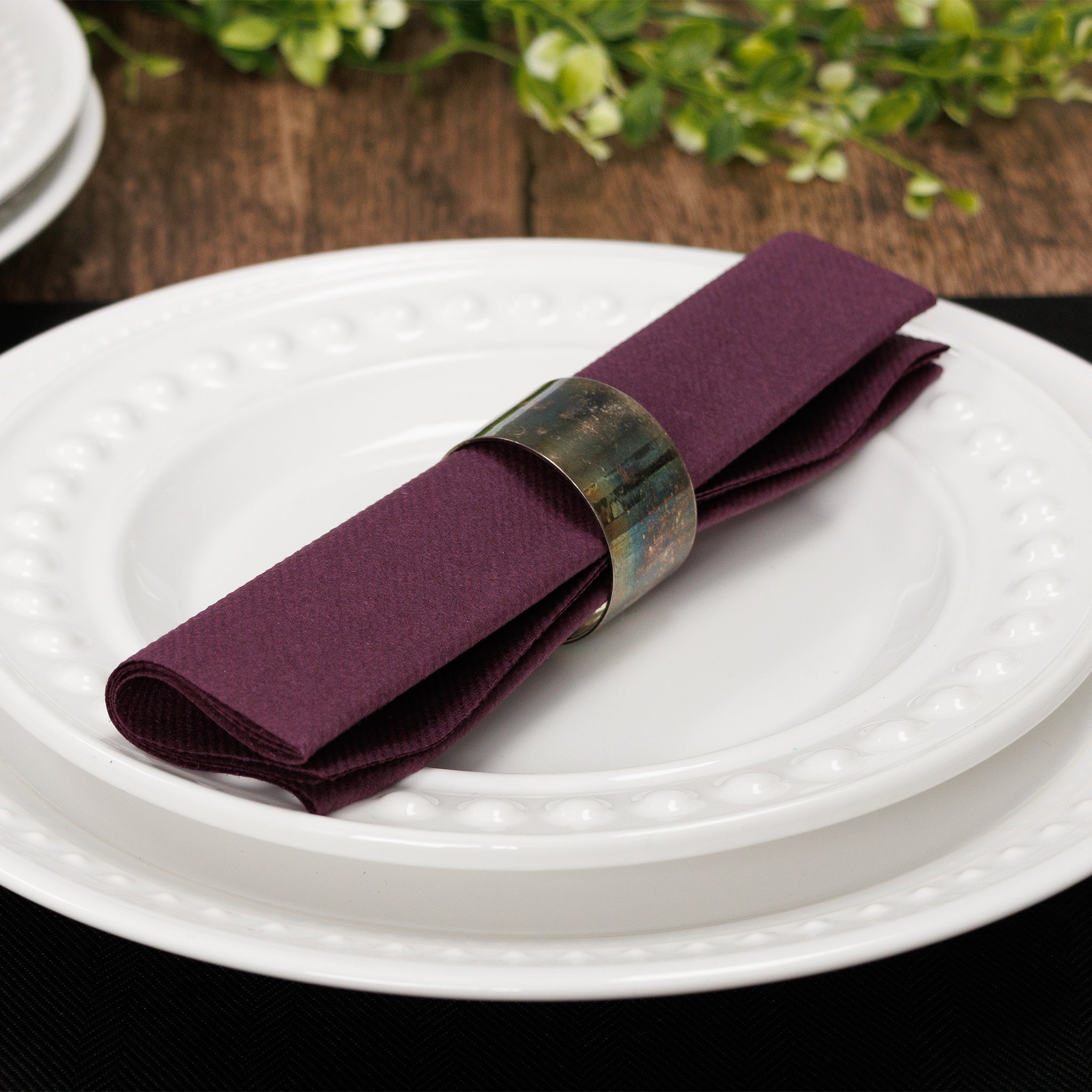 Plum dinner napkin with rustic table setting