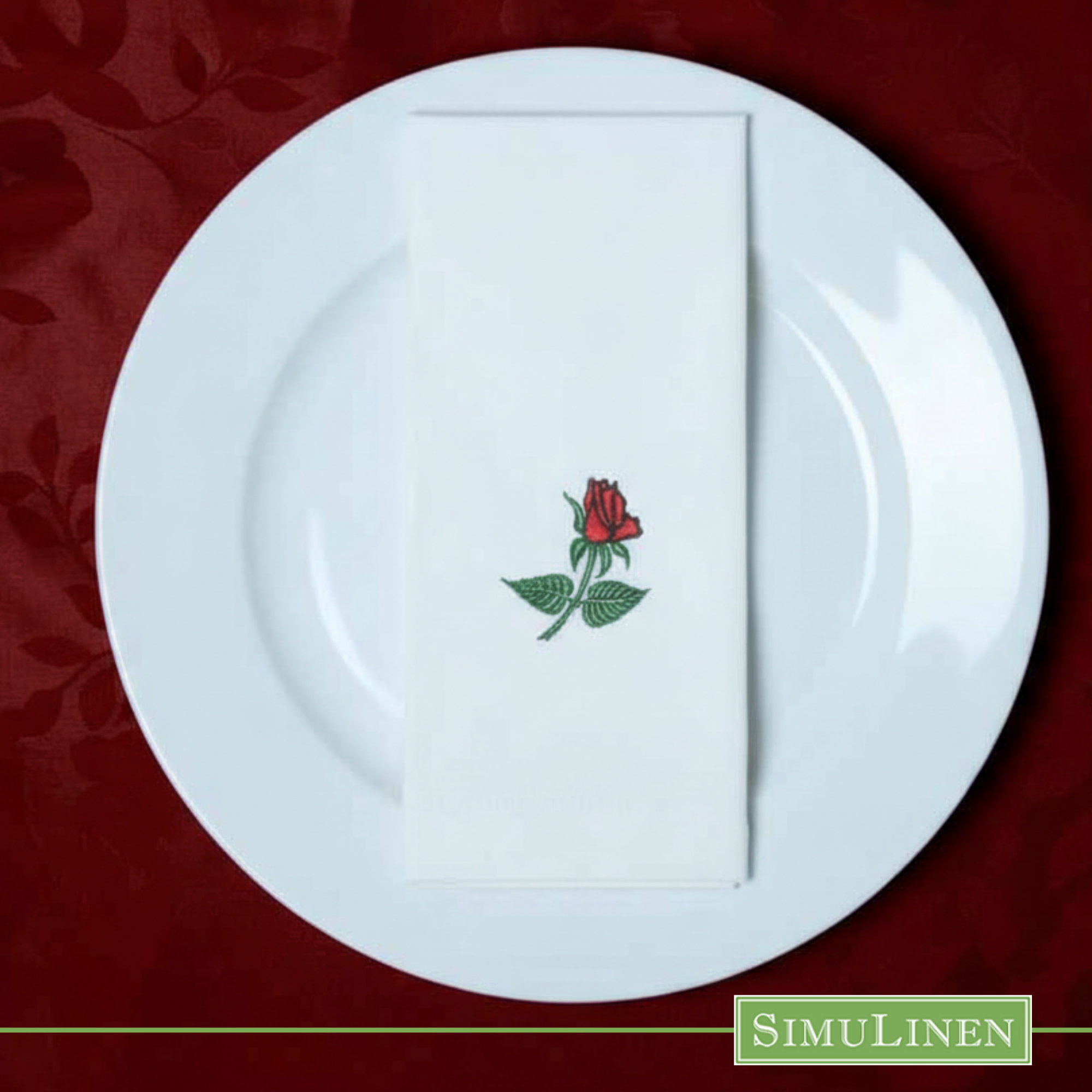 Single rose SimuLinen dinner napkin on plain white plate