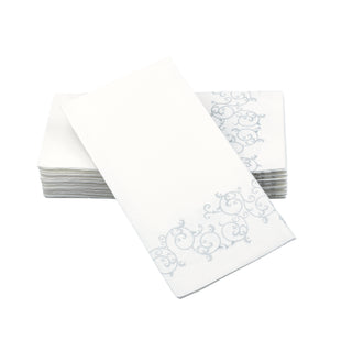 Image of disposable silver floral guest towels. These are a white guest towel with silver floral accents along the bottom of the napkin.