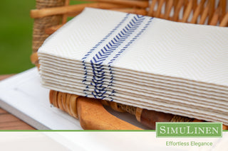 A close-up of SimuLinen ClassicPoint blue bistro disposable dinner napkins.