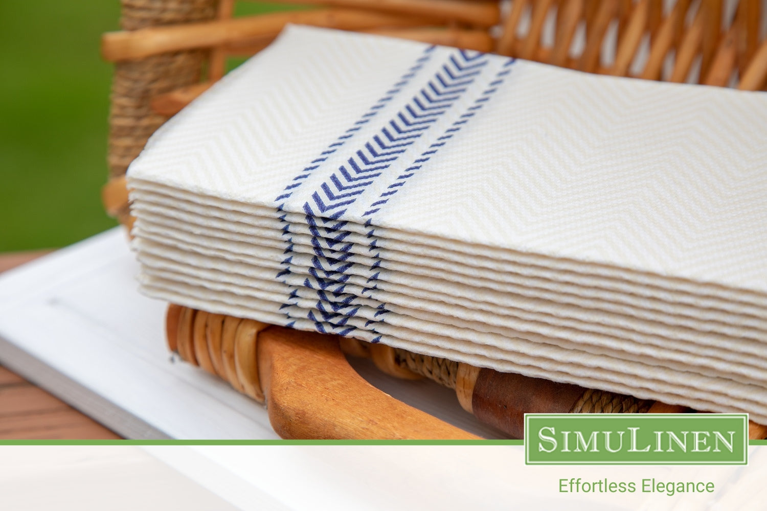 A close-up of SimuLinen ClassicPoint blue bistro disposable dinner napkins.