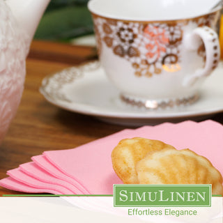 SimuLinen dark pink disposable beverage napkins with a fancy tea cup in the background.