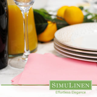 SimuLinen bubblegum pink beverage napkins in a dinner setting.