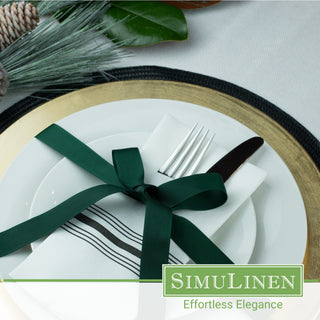 SimuLinen Black Bistro disposable luxury paper pocket napkins on a fancy dinner plate.
