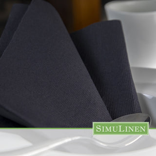Close-up of SimuLinen ClassicPoint solid black napkins.