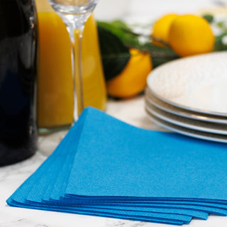 Aqua Blue beverage napkins with mimosa setting