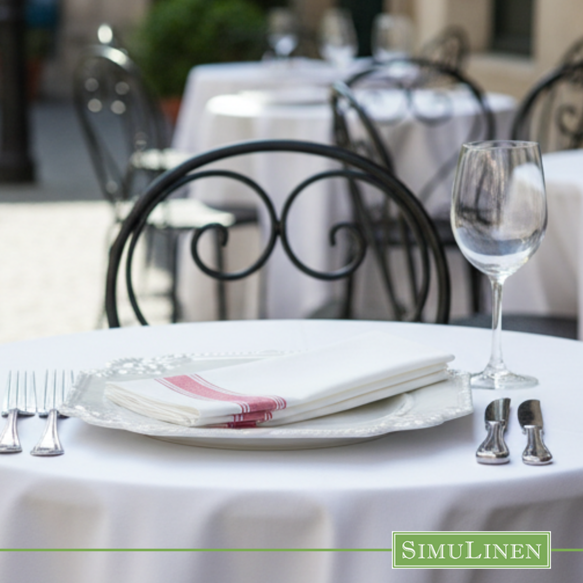 Red bistro stripe SimuLinen dinner napkin at a restaurant setting