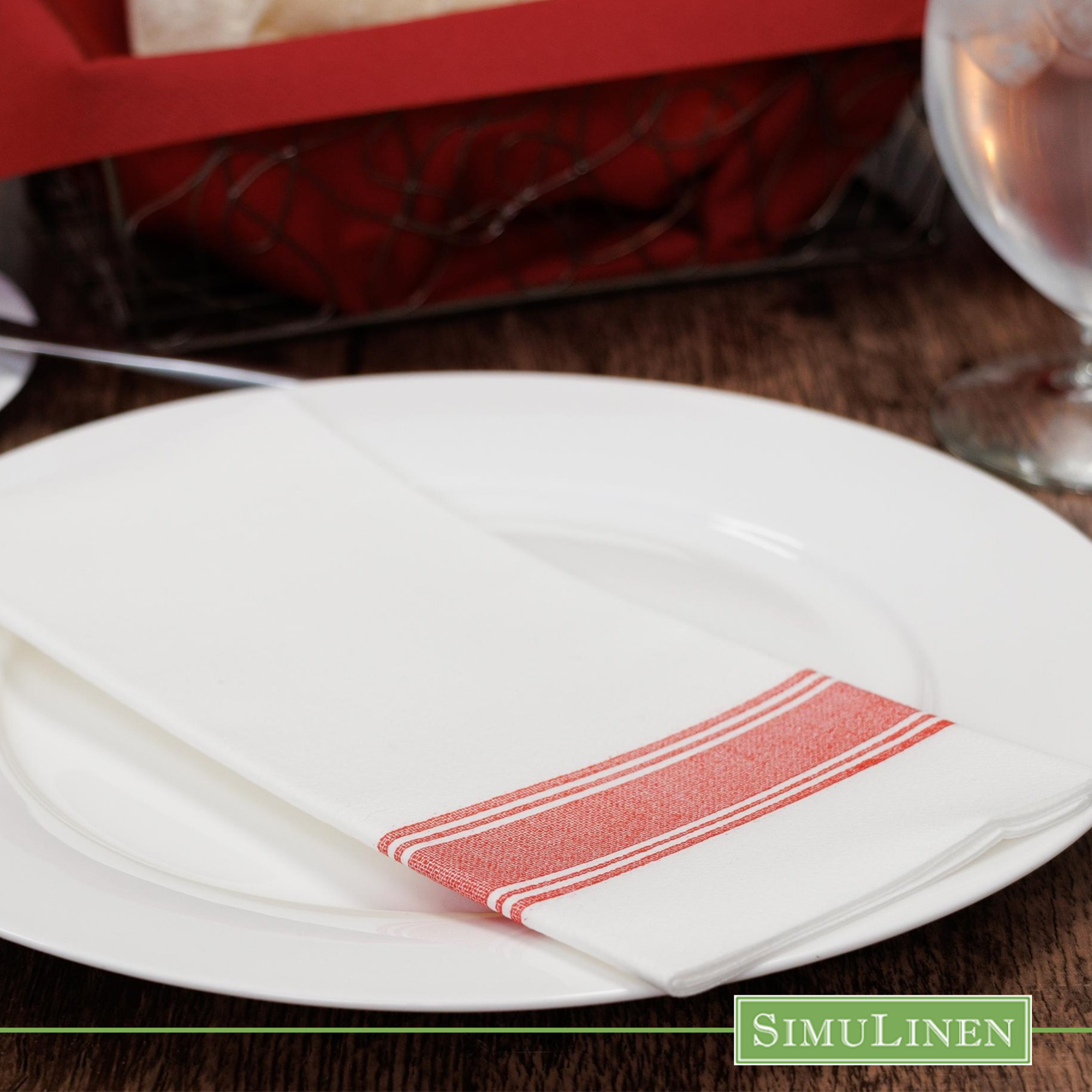 Red bistro stripe SimuLinen dinner napkin on white plate restaurant setting