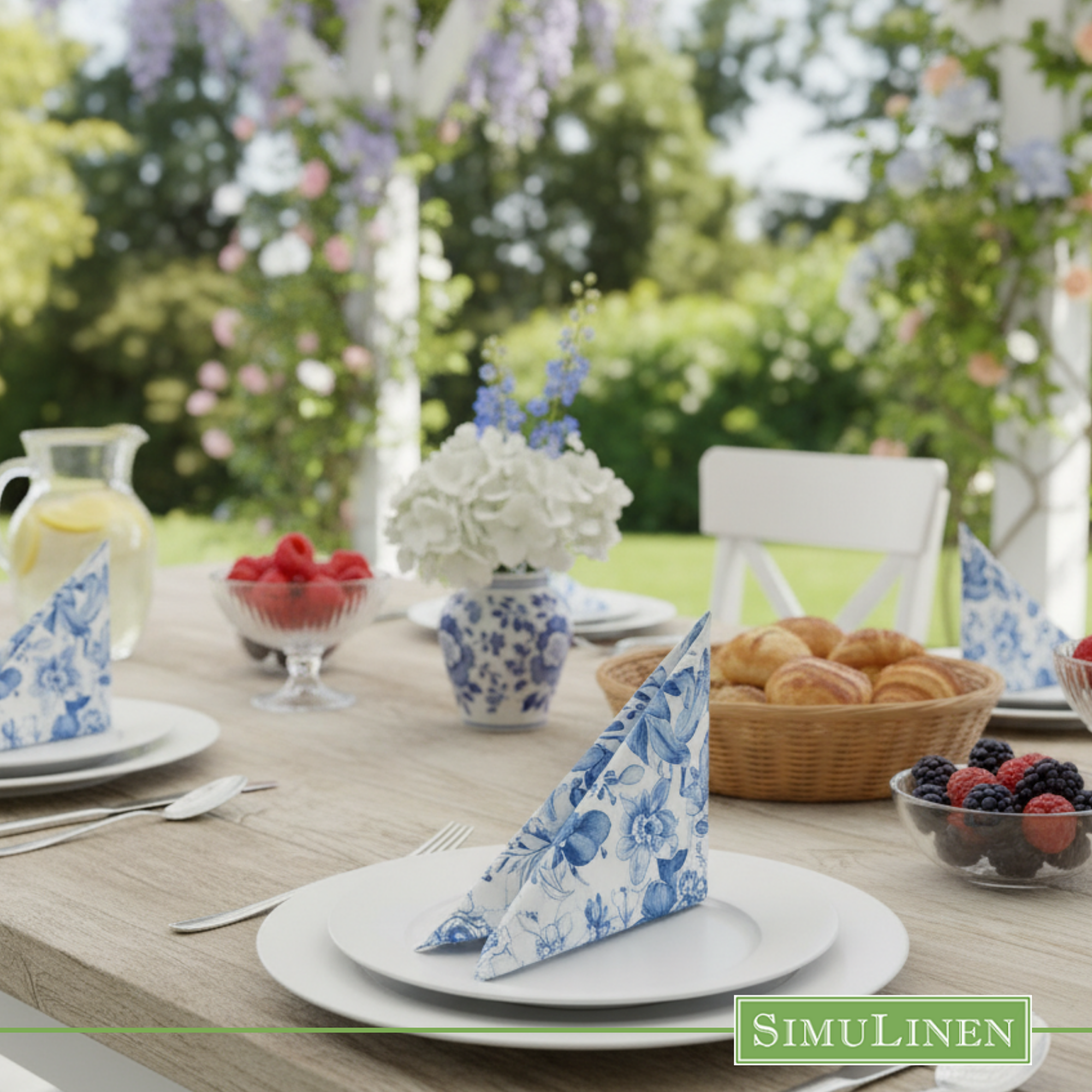 Blue floral garden SimuLinen dinner napkin folded on white plate 