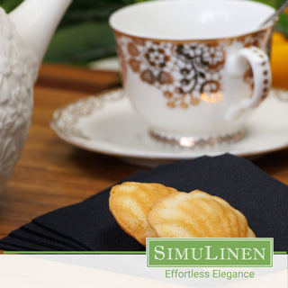 SimuLinen black beverage napkins with a fancy tea cup in the background.