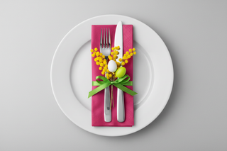 Bright fuchsia napkin on plate