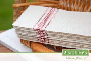 A close-up of SimuLinen ClassicPoint Red Bistro Napkins in a picnic setting.