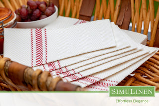 SimuLinen Red Bistro Stripe napkins in a picnic basket.