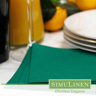 Dark green luxury paper beverage napkins in a dinner setting.