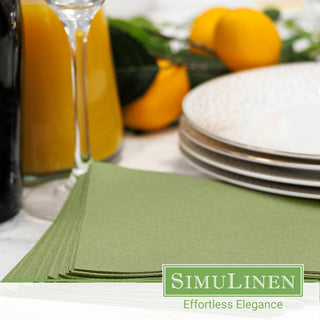 Olive green beverage napkins in a dinner setting.
