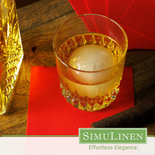 SimuLinen red cocktail napkins with a glass of whiskey.
