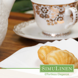 SimuLinen white beverage napkins with a fancy tea cup.