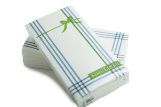 Image of blue plaid guest towels in their shrink-wrap packaging.